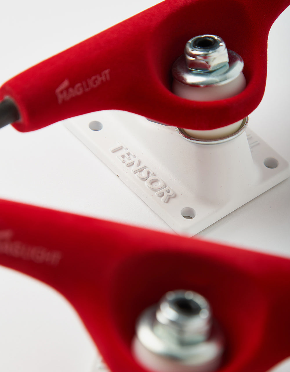 Tensor Velvet Mag Light 5.25 Skateboard Trucks - Red/White (Pair)