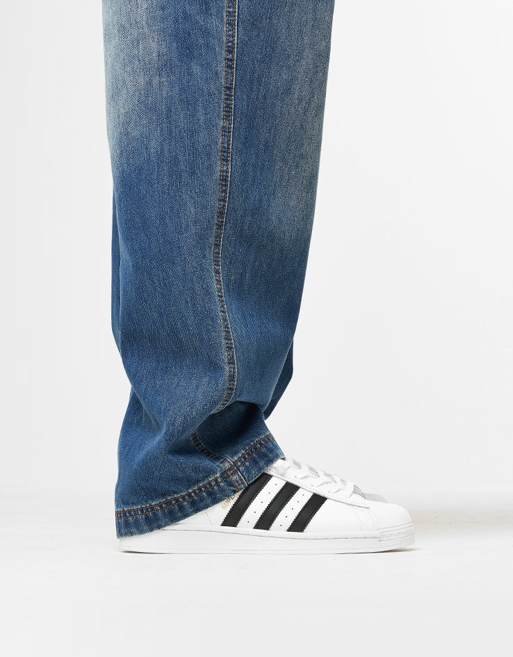 Butter Goods x Peanuts Spike Denim Jeans - Distressed Indigo